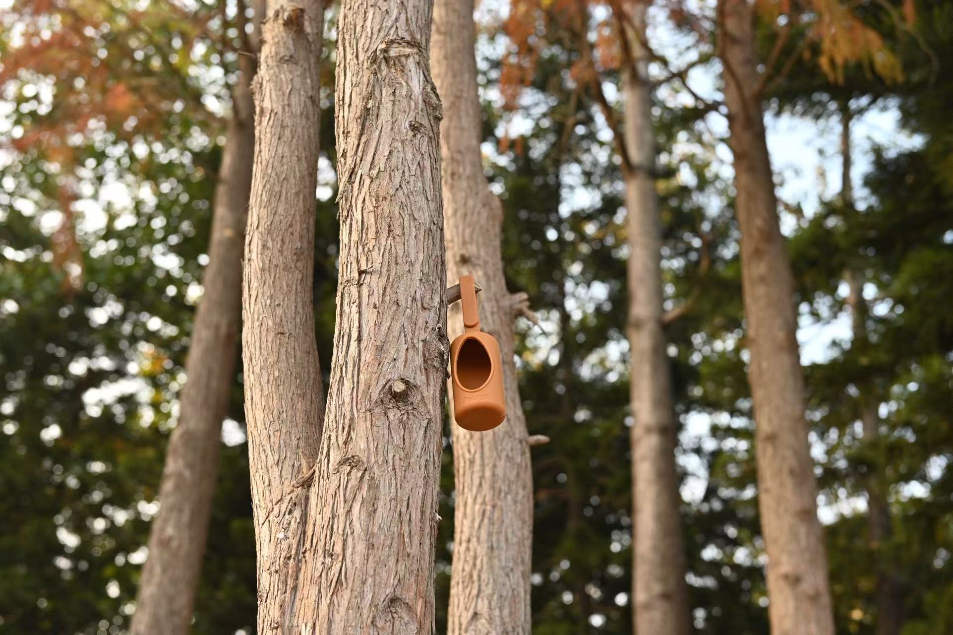 pawos dispenser brown on the tree